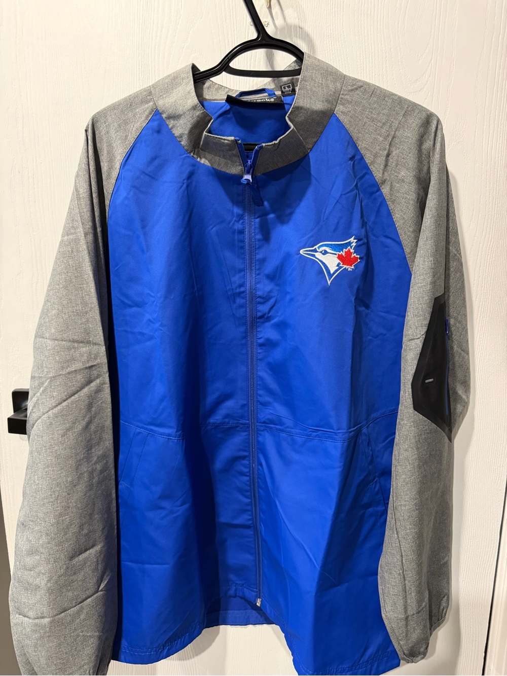 Dunbrooke Blue and Gray Raglan Windbreaker with Team Patch